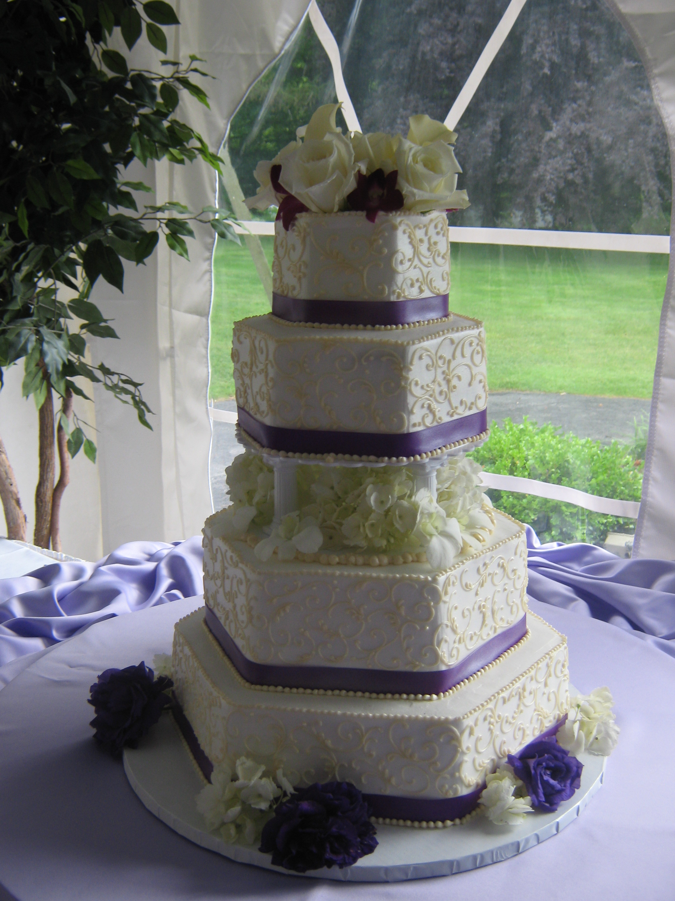 Wedding cake greenery tower photo